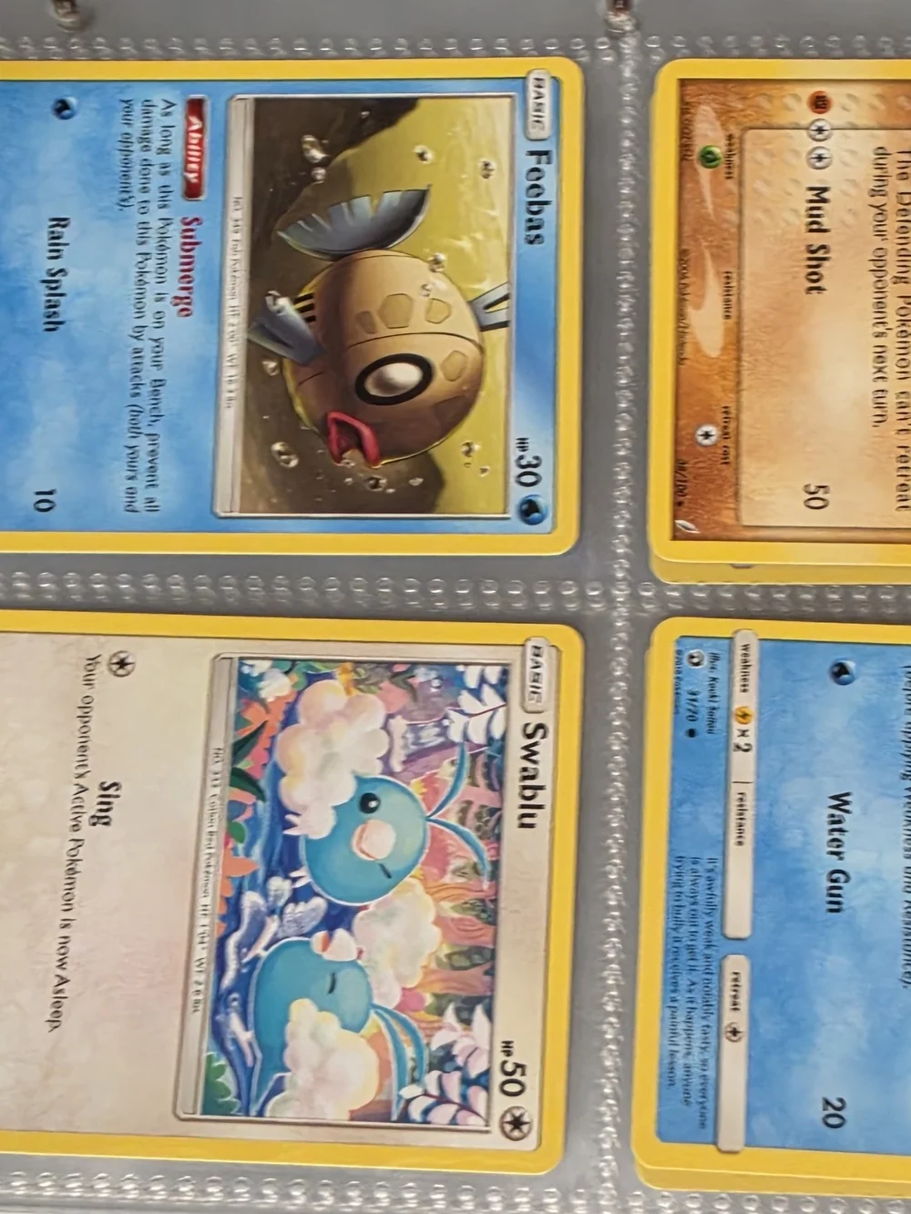 Pokemon Red and Blue Pokemon Card Binder And 53 Pokemon Cards.